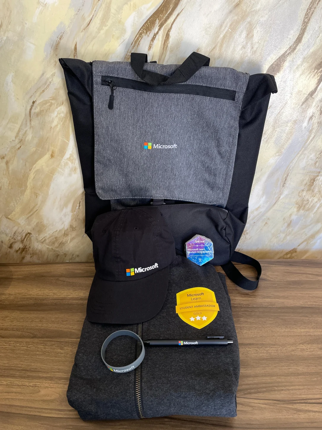 Swag de Gold Student Ambassador recebido no segundo semestre de 2025